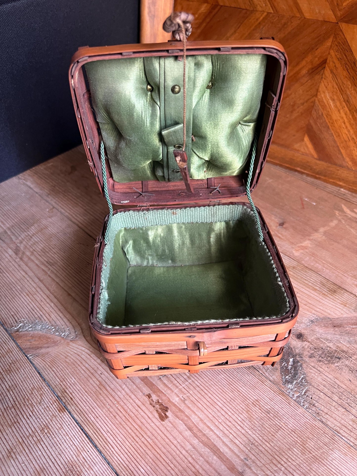 Vintage bamboo hand woven sewing basket. Green satin lined small lidded sewing basket.