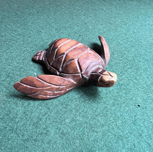 Hand carved Monkey wood swimming turtle figure.