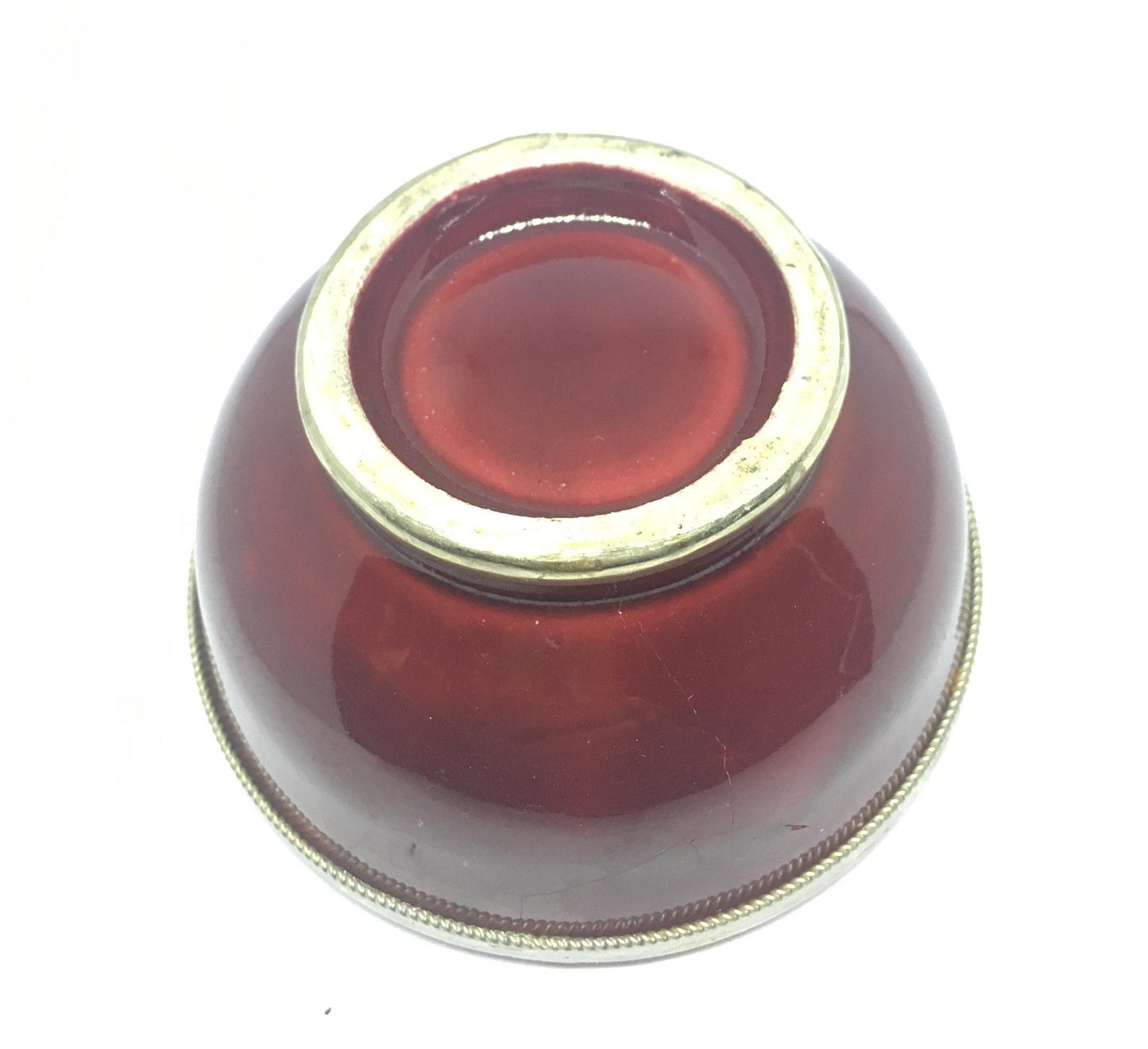 Vintage red glazed trinket pin dish with silver tone band.