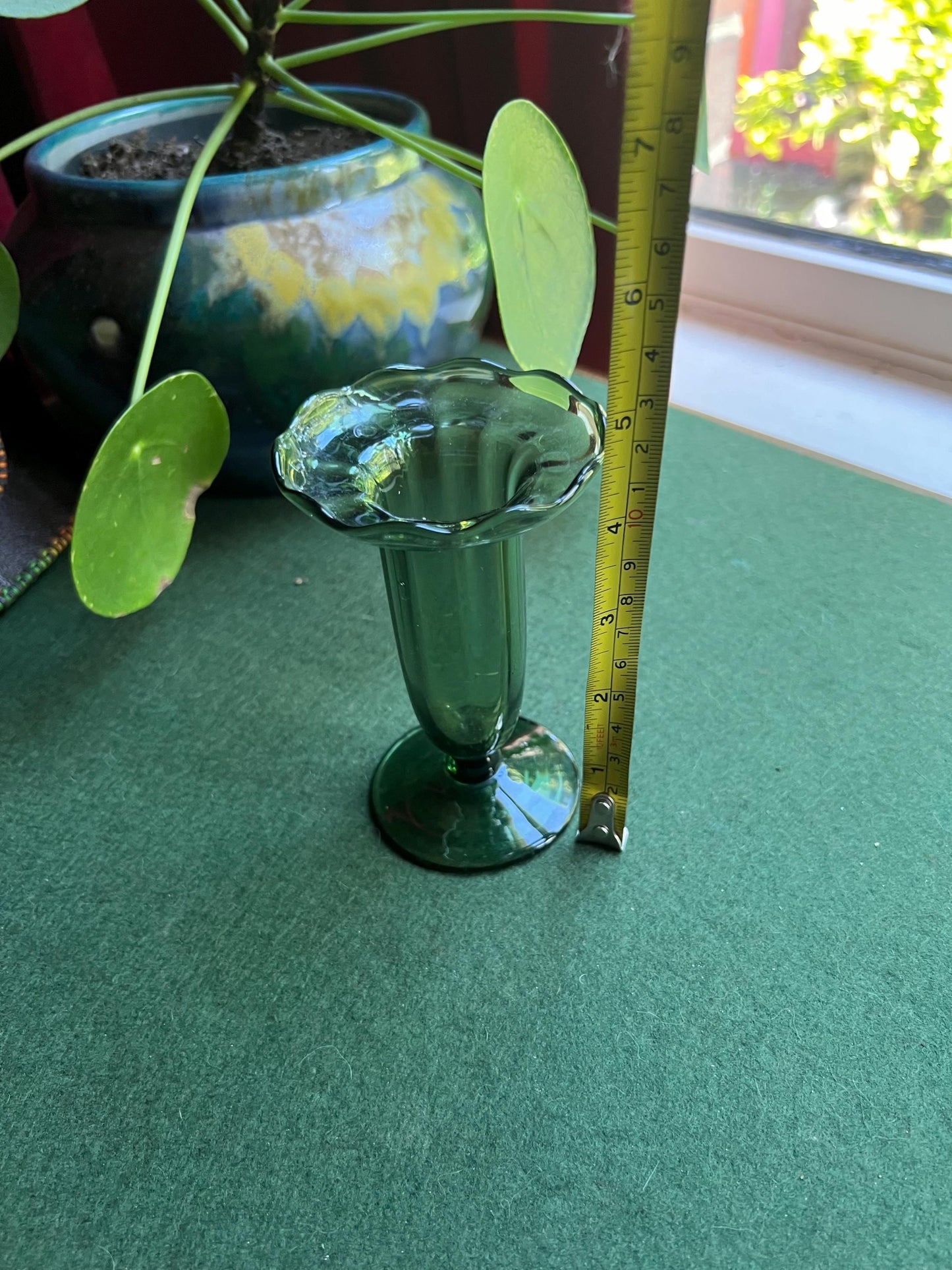 Green glass vase.