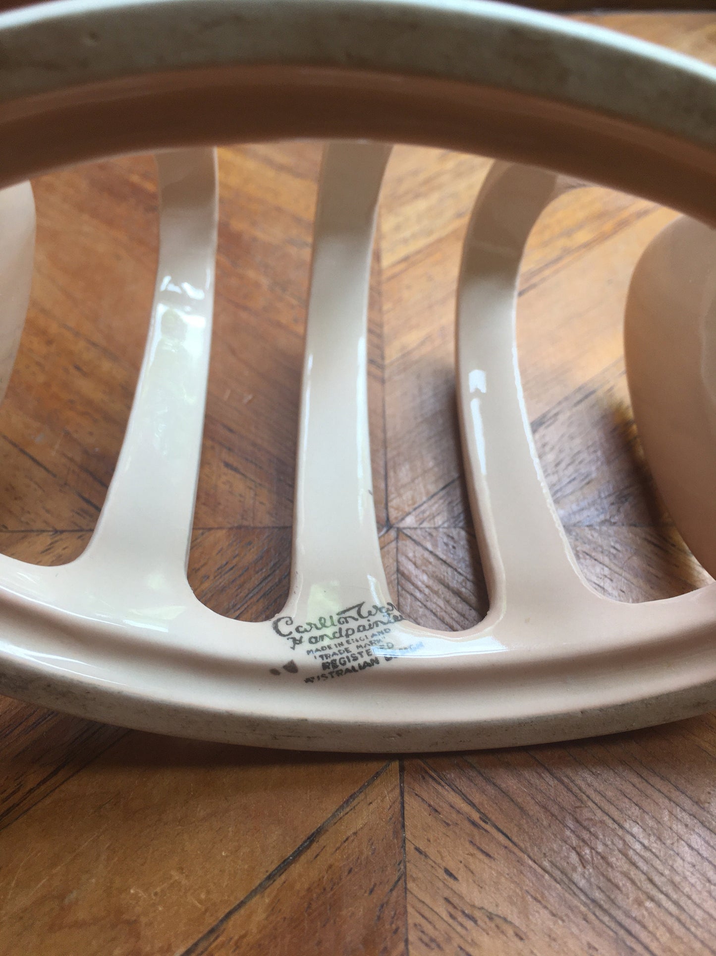 Carlton Ware pink ceramic toast rack. Pink raised flower detail. Stamped.