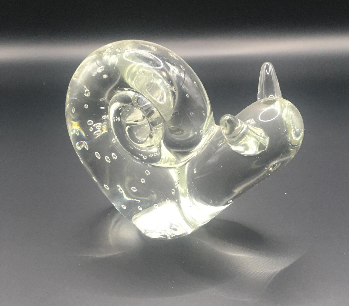 Art glass snail paperweight figurine . Cute clear glass snail with bubbles.