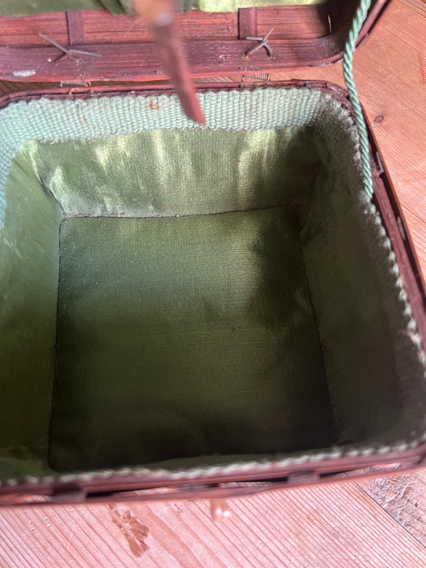 Vintage bamboo hand woven sewing basket. Green satin lined small lidded sewing basket.
