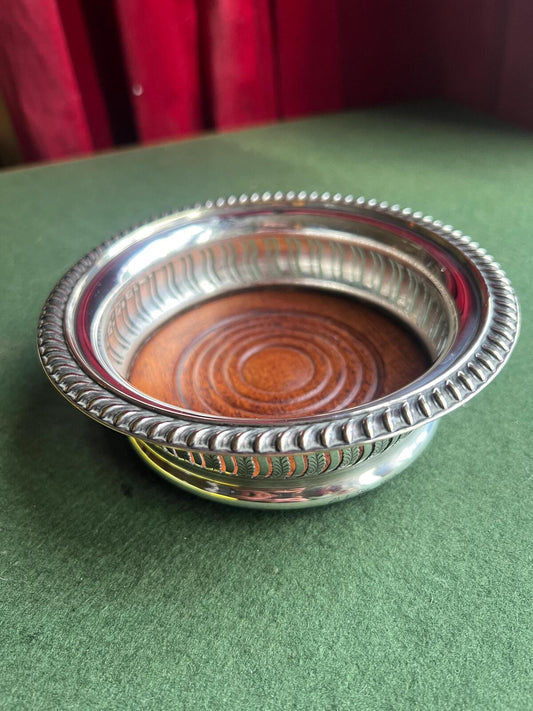 Antique vintage wine coaster. Silver plate and mahogany wood Barker Ellis style bottle coaster.