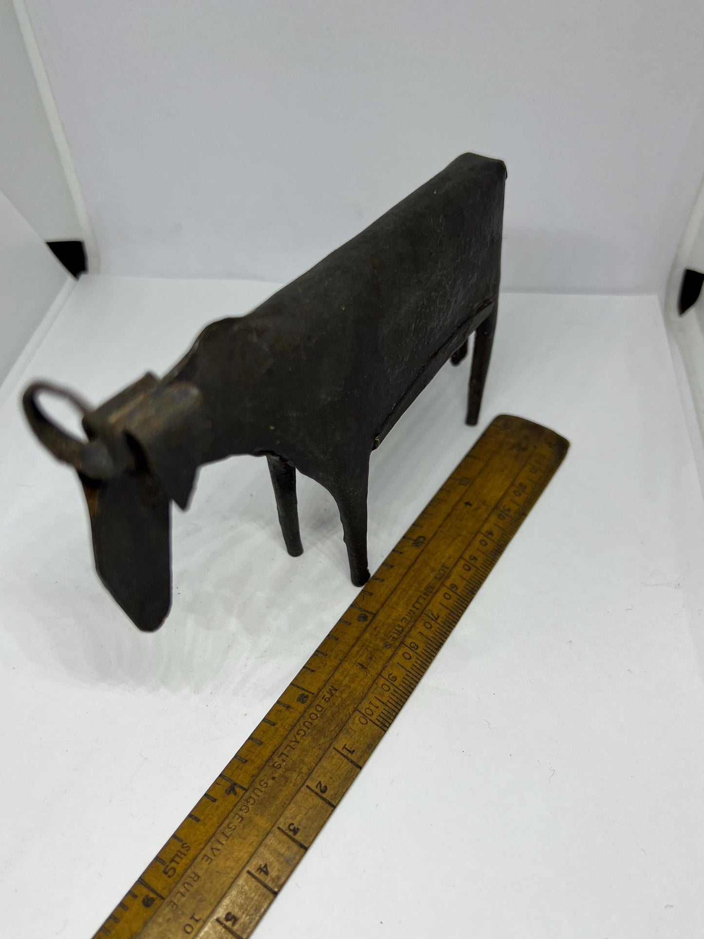 Brutalist metal cow sculpture.  Iron abstract folk art figurine.