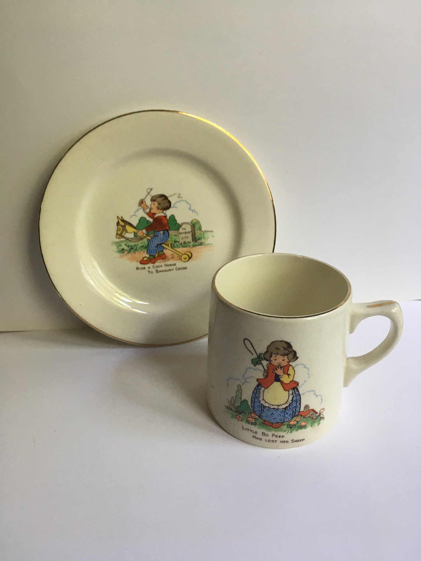 Beautiful Vintage Child's breakfast set. Ducal ware child's cup and plate set. Little Bo Peep and Ride a Cock Horse illustrations.
