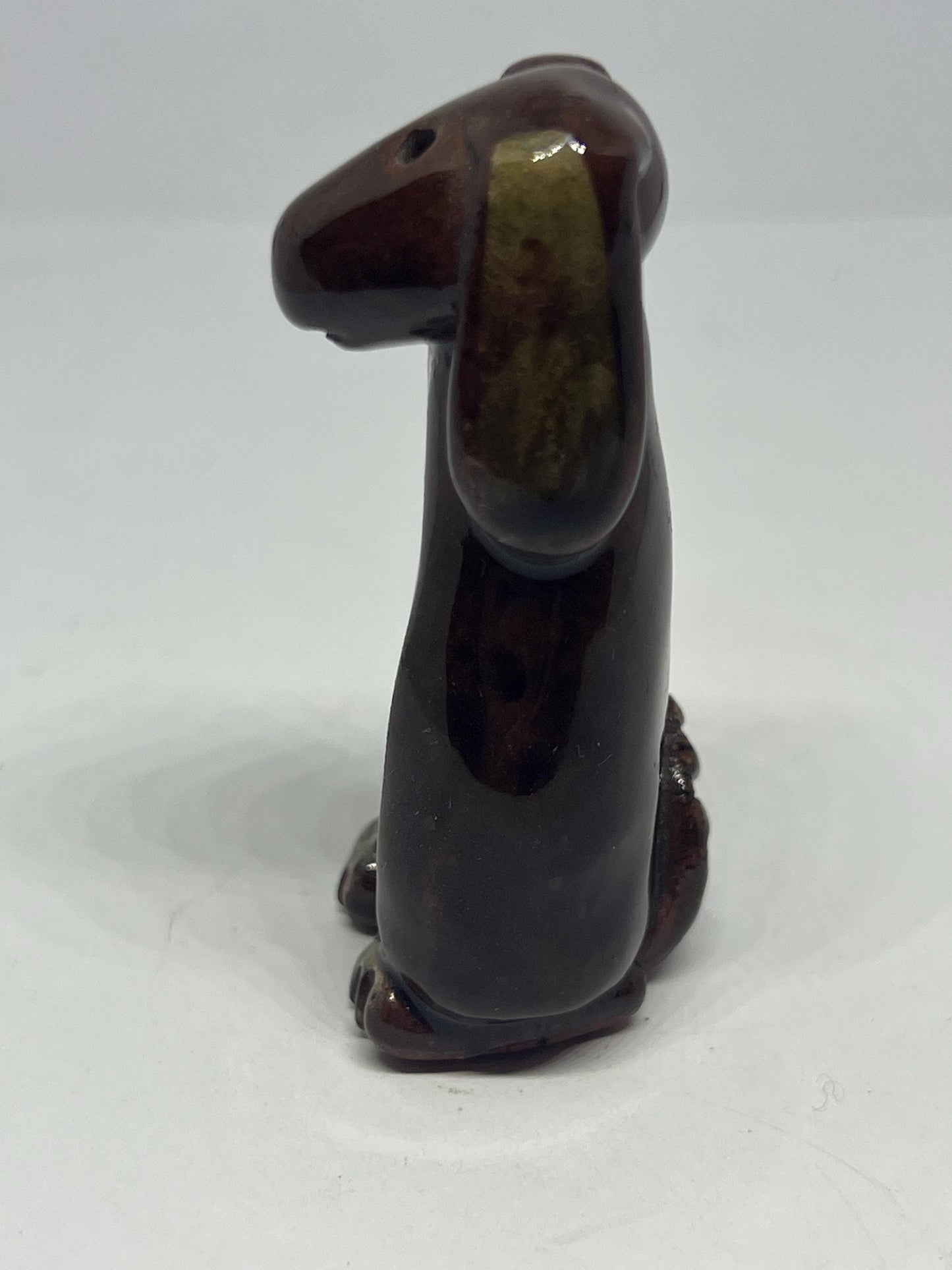 Tiny studio pottery dog figurine.