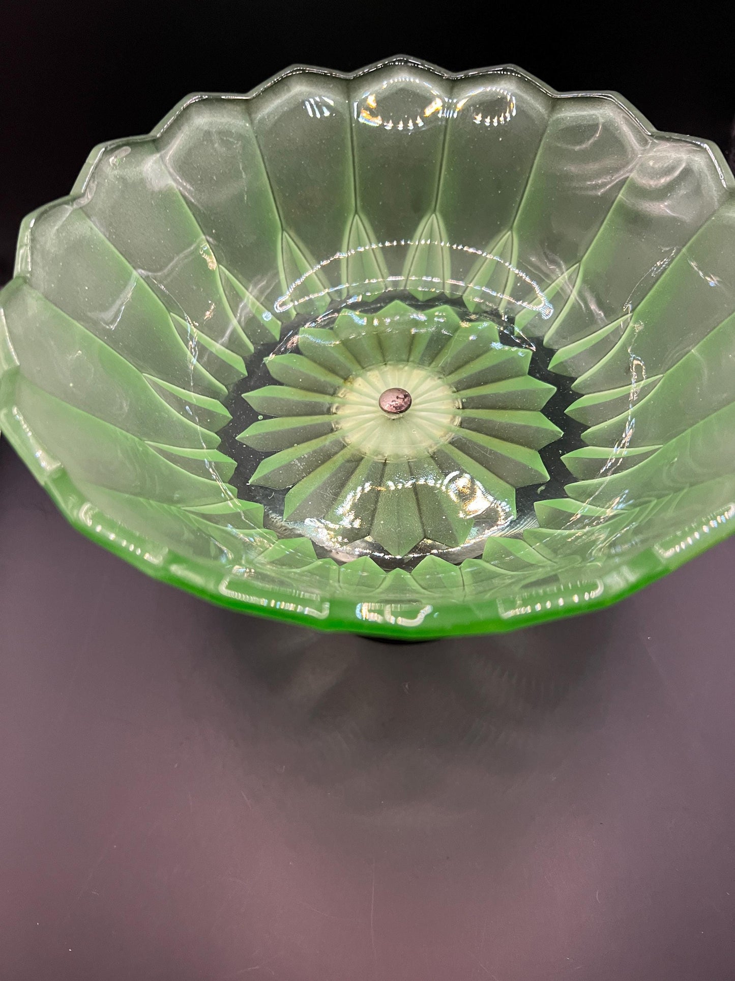 1930s green stretch glass pedestal bowl on silver tone base.