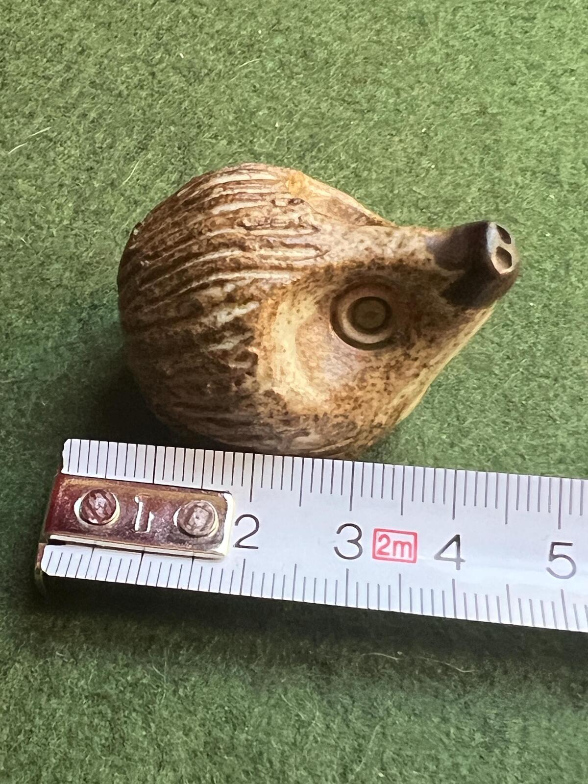 Miniature hedgehog figurine. 1970s Studio pottery hoglet ornament.