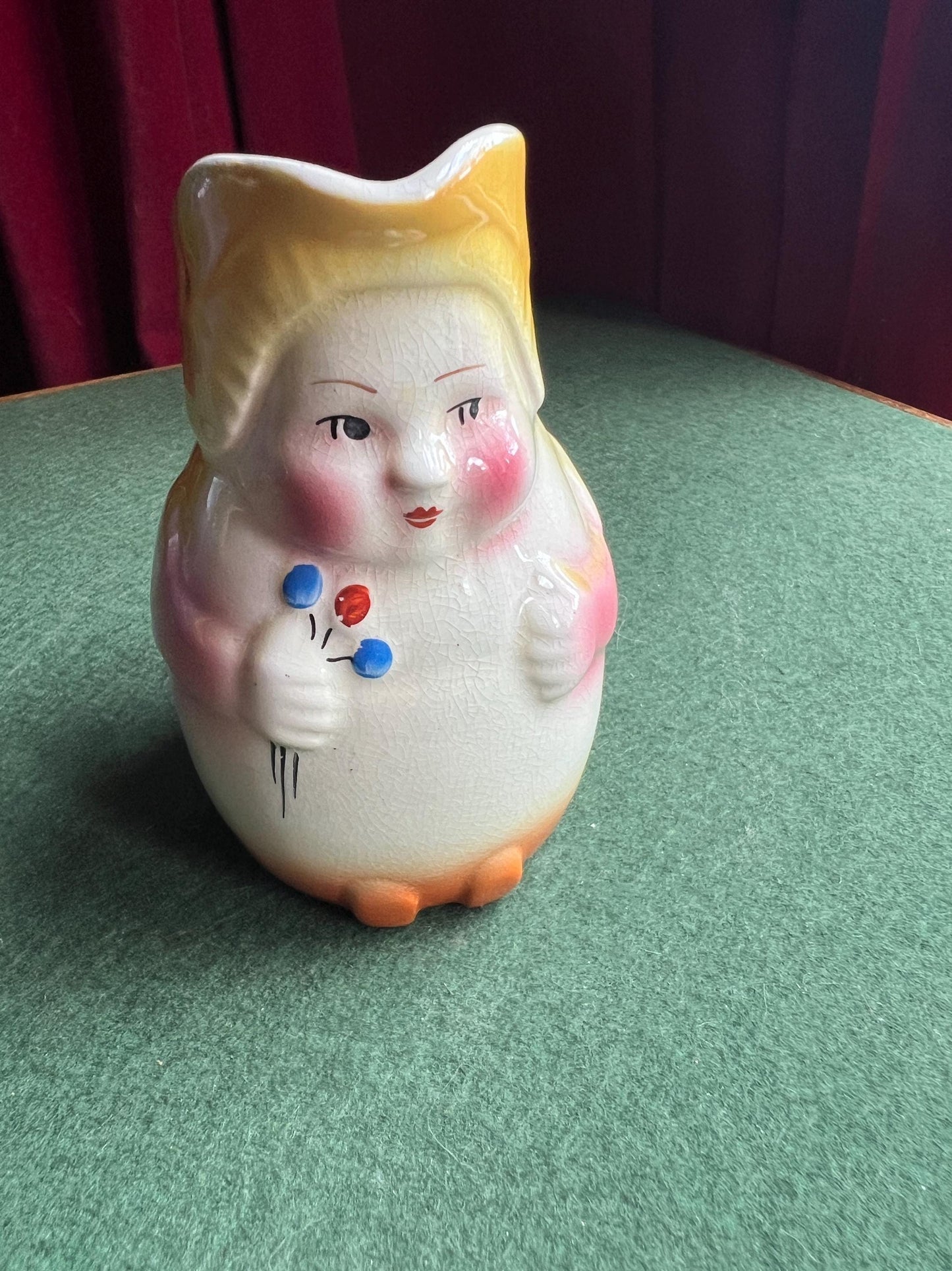 Erphila Czechoslovakia hand painted lady holding flowers vase milk jug.