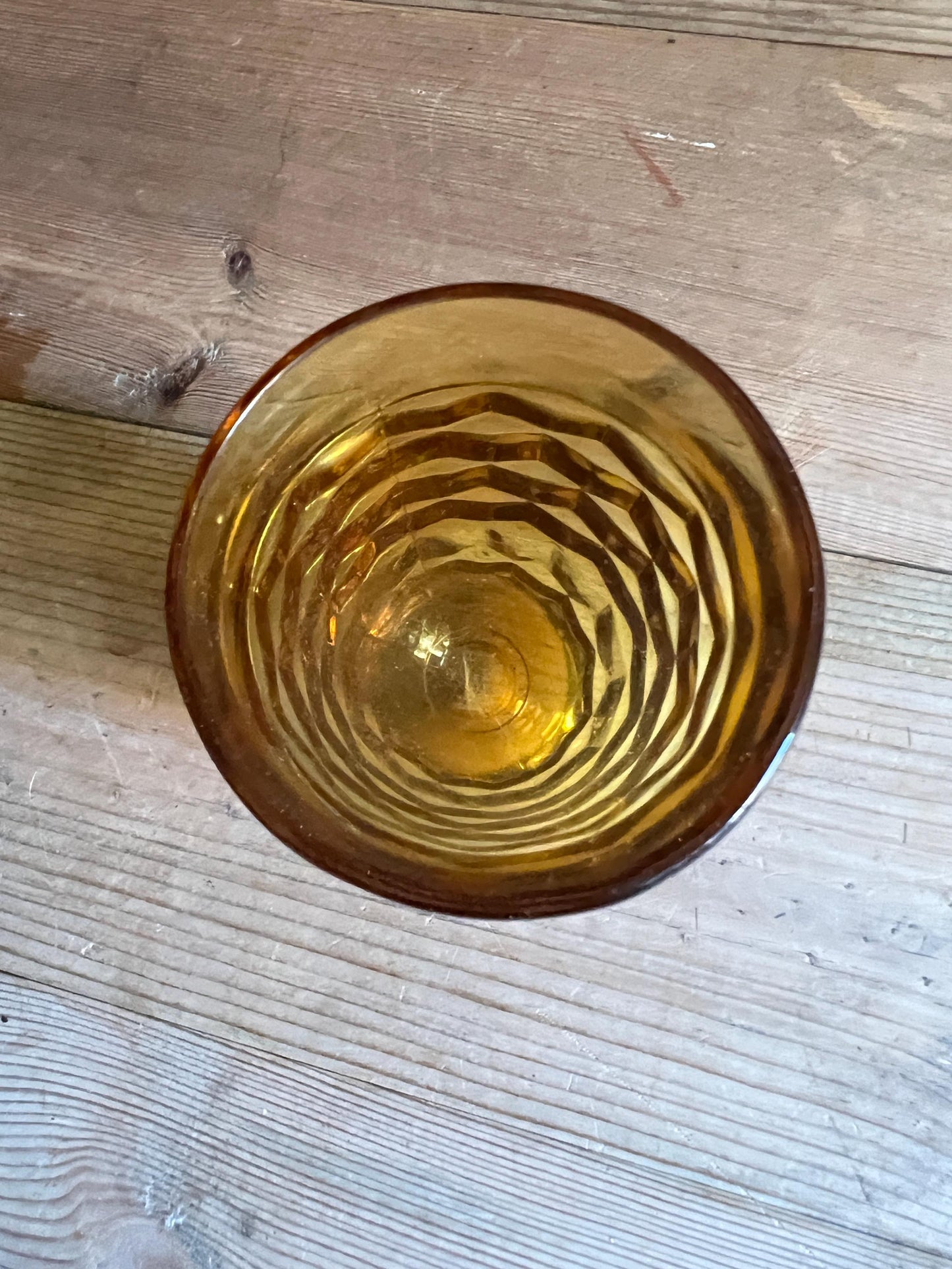 Vintage footed tumbler. Indiana Whitehall Amber glass cubist design drink ware.