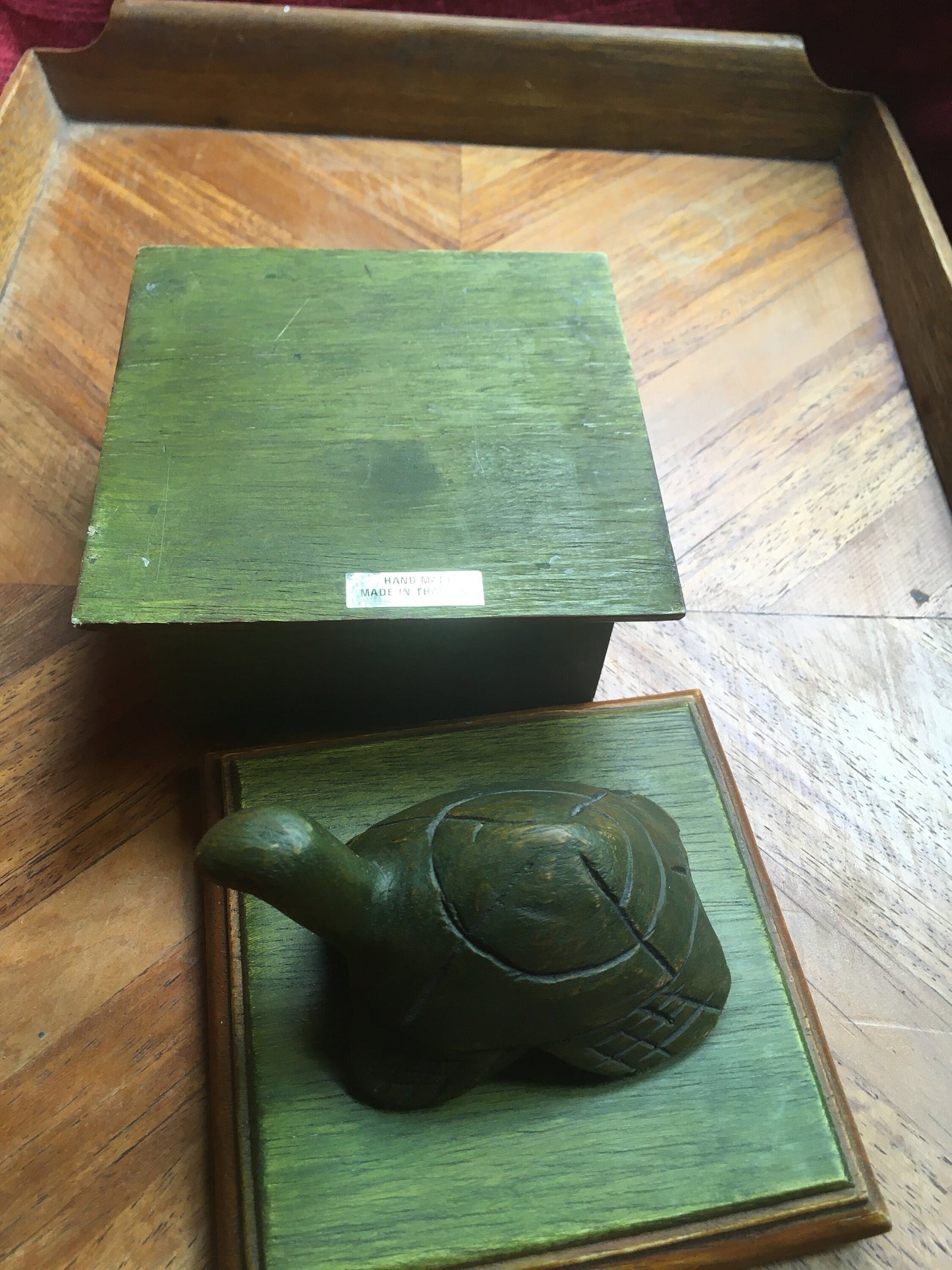 Hand-carved tortoise-lidded square wooden box. Made in Thailand.