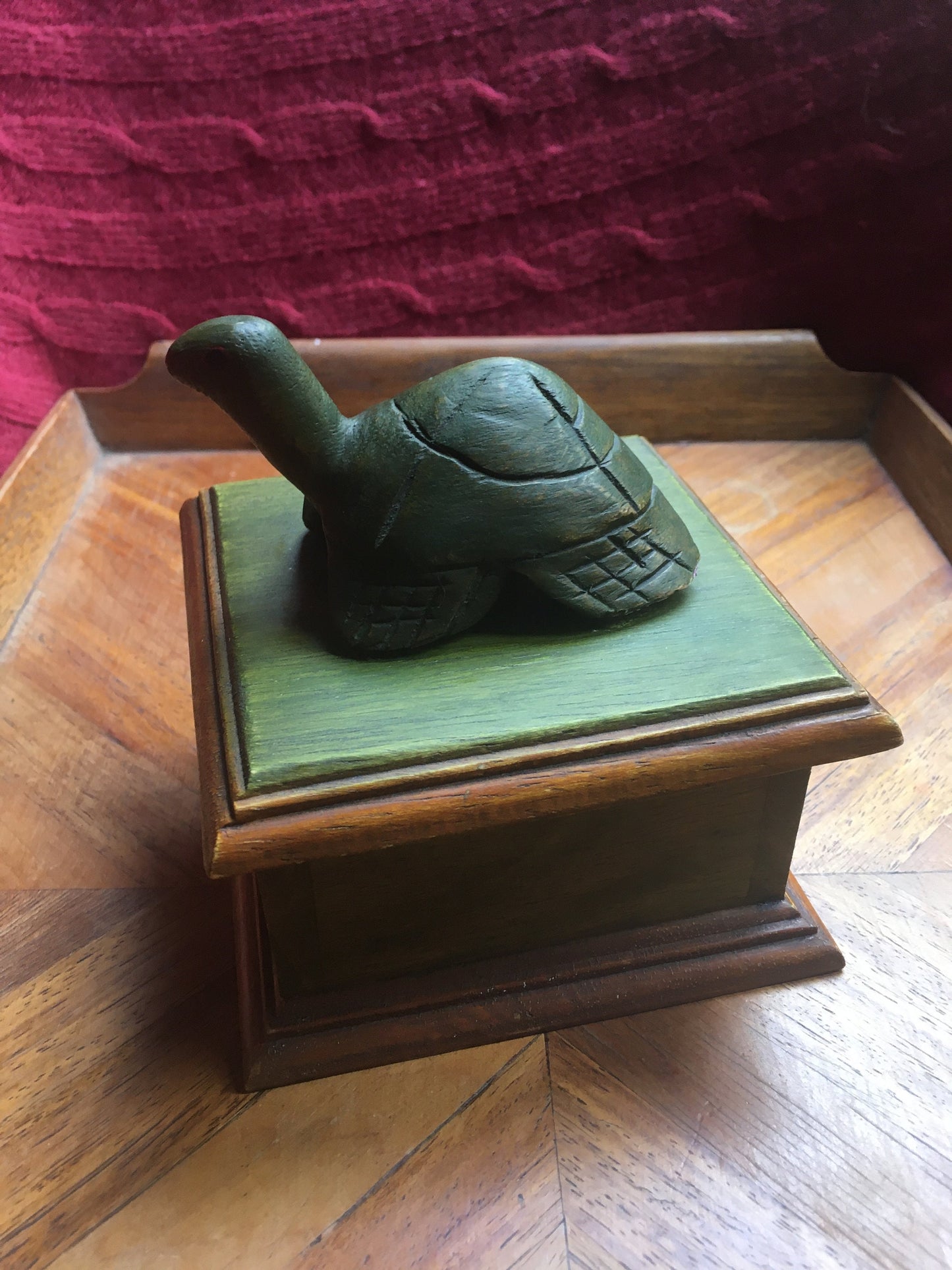 Hand-carved tortoise-lidded square wooden box. Made in Thailand.