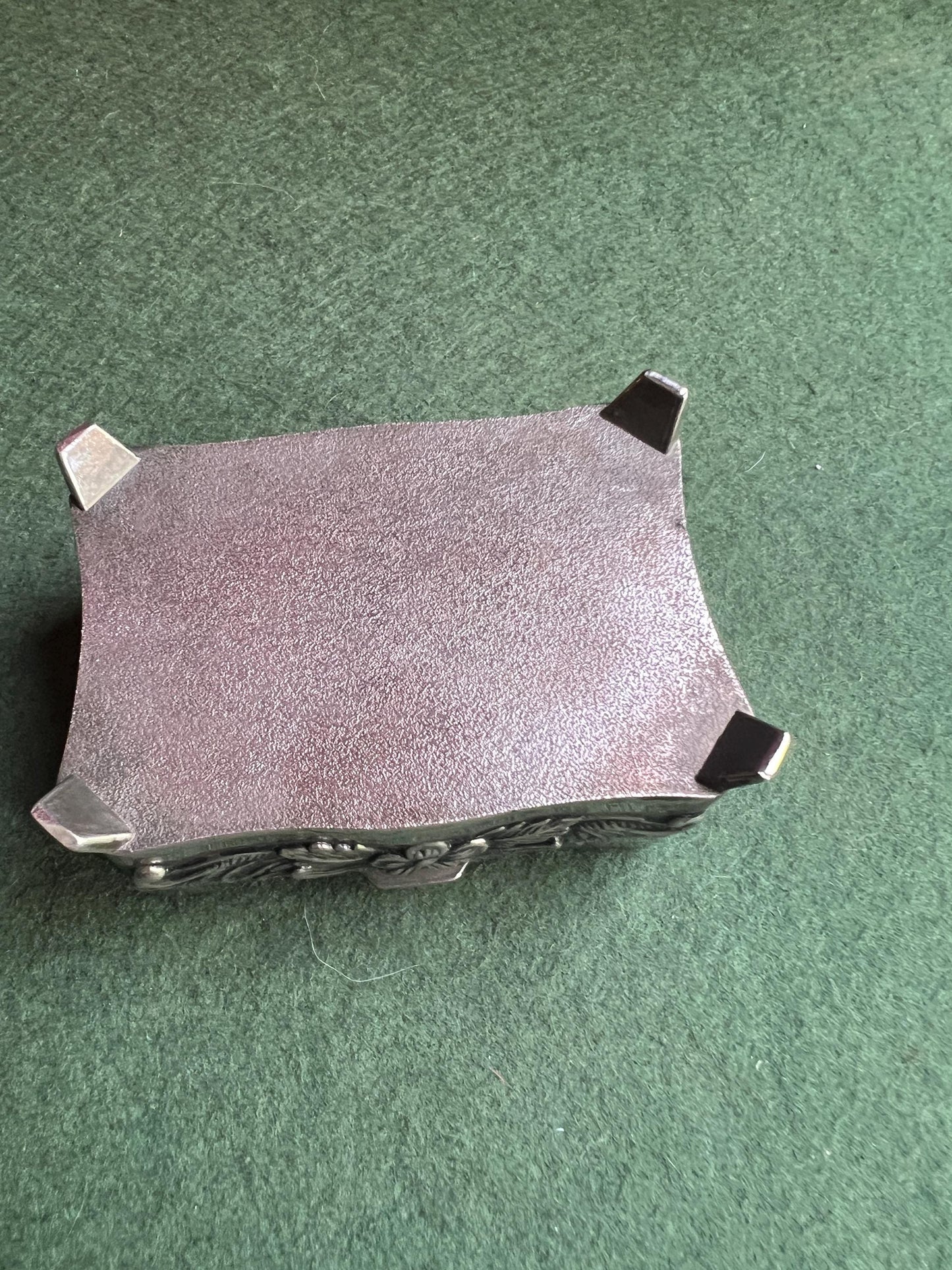 Vintage silver tone jewellery box. Embossed floral design treasure box blue lining.
