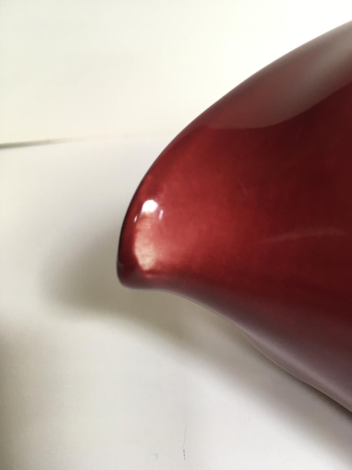 Deep red glazed gravy custard serving jug. Stamped South Seas JG Meakin.