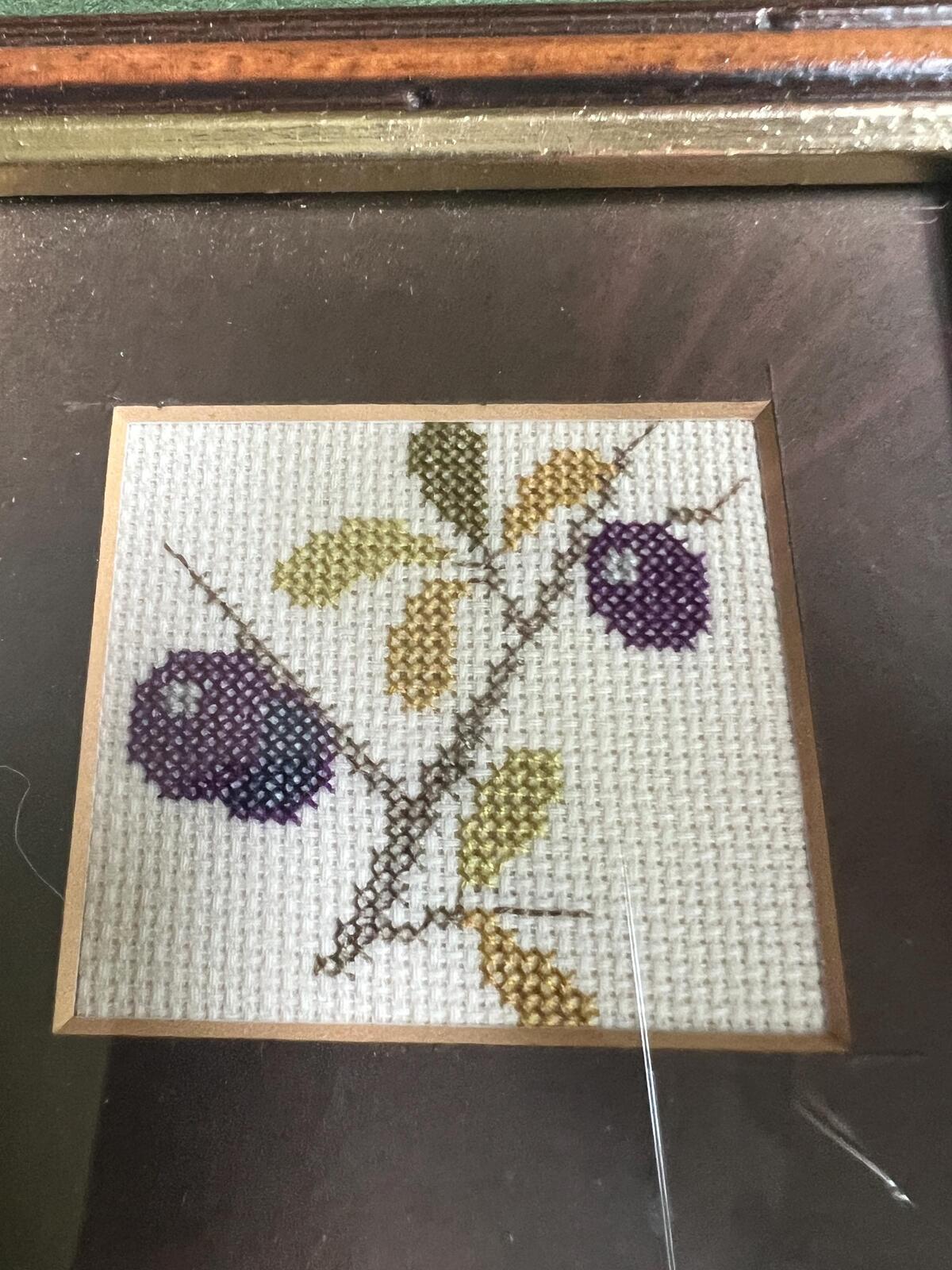 Hand stitched plum framed embroidery picture. Danish textile art gallery wall decor. Fruit theme textile arts.
