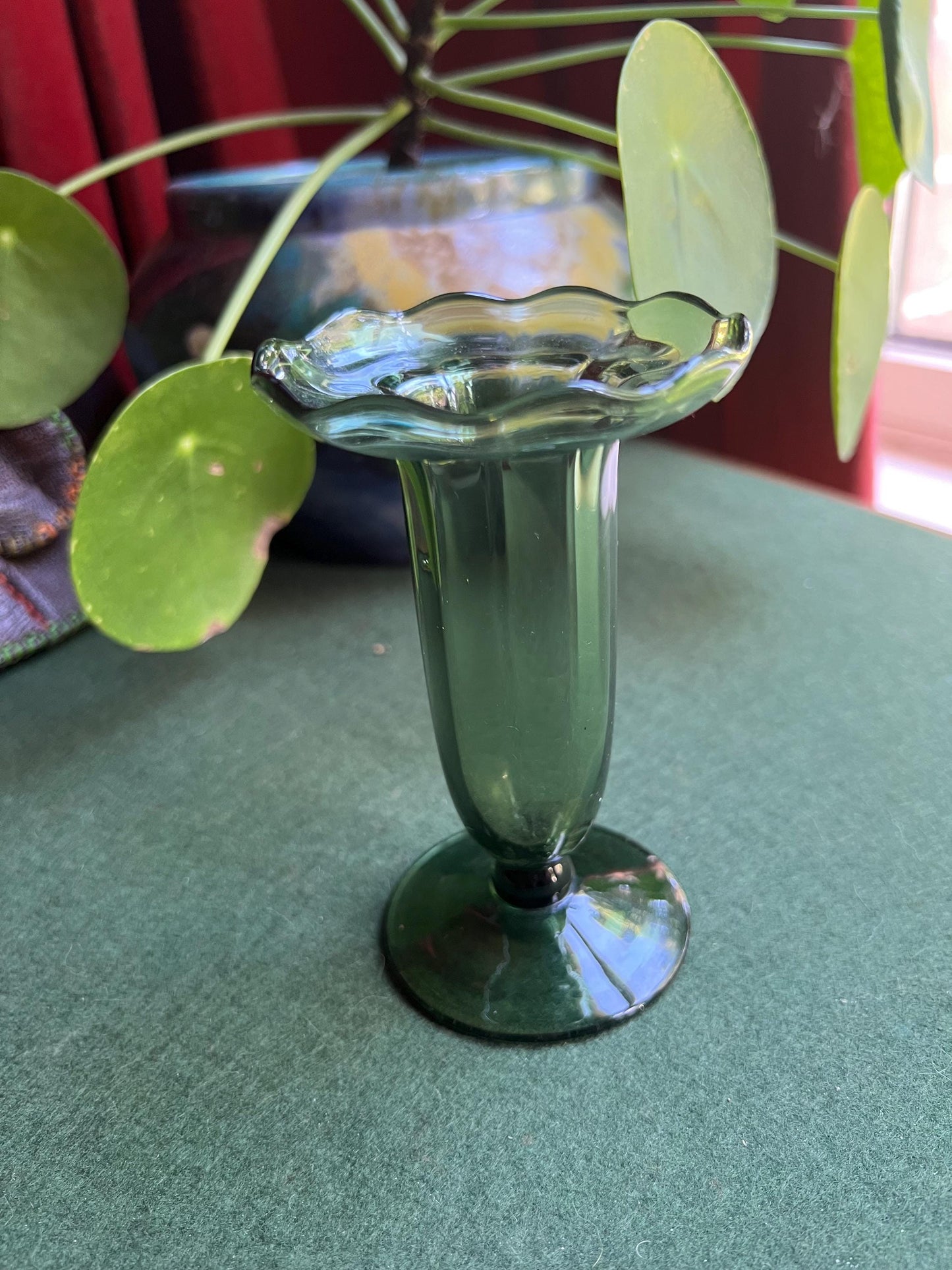 Green glass vase.