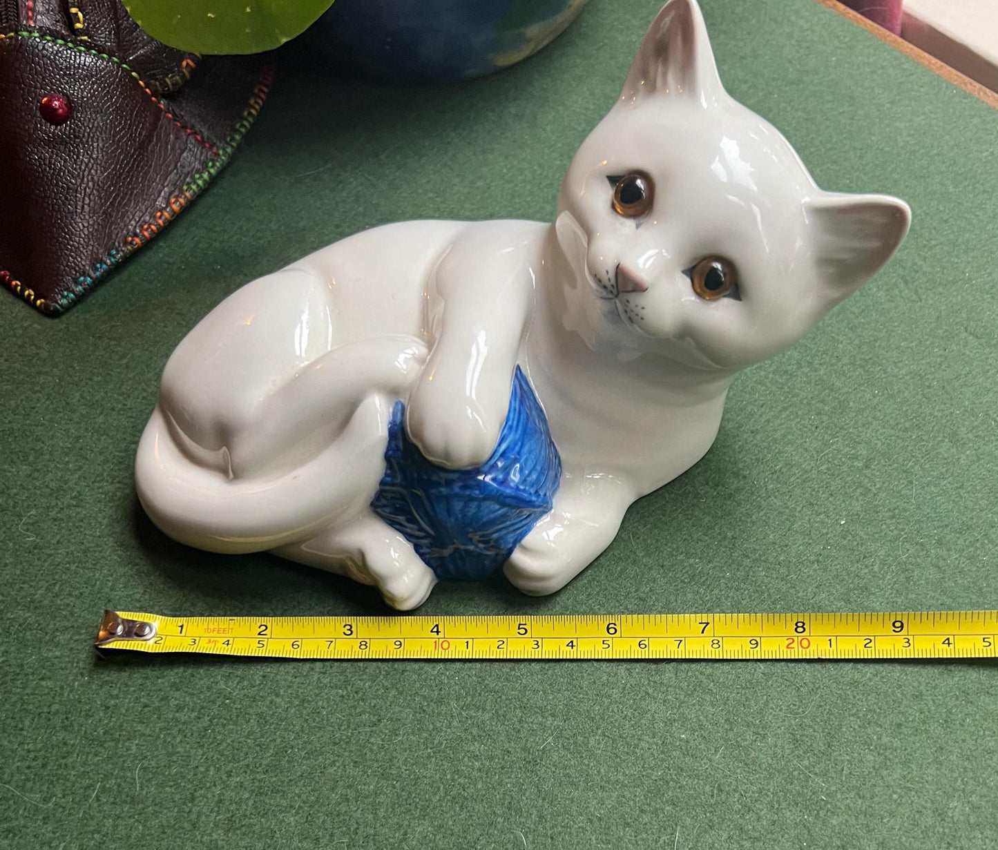 White kitten figurine with a ball of wool. Just Cats & co Staffordshire England.