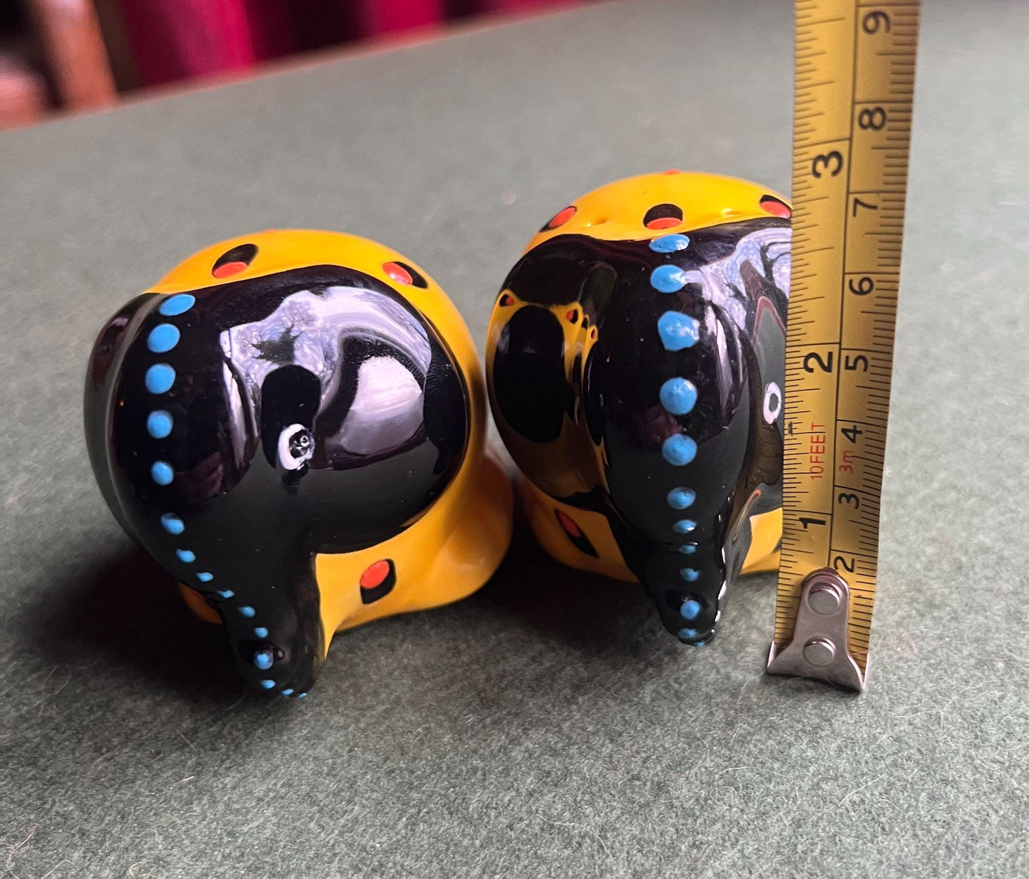 Quirky elephant salt and pepper shakers. Signed to base SUNA SA.