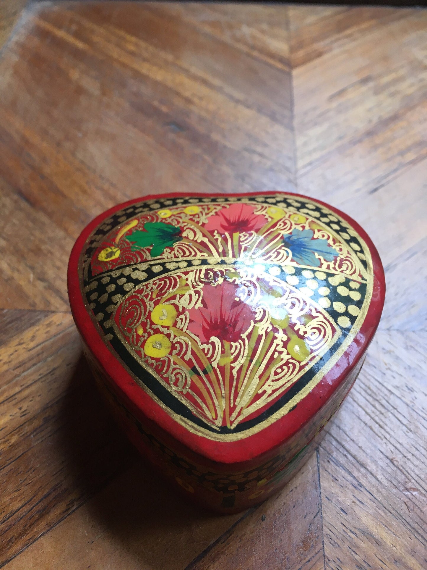 Beautiful hand-painted heart shaped lidded box.