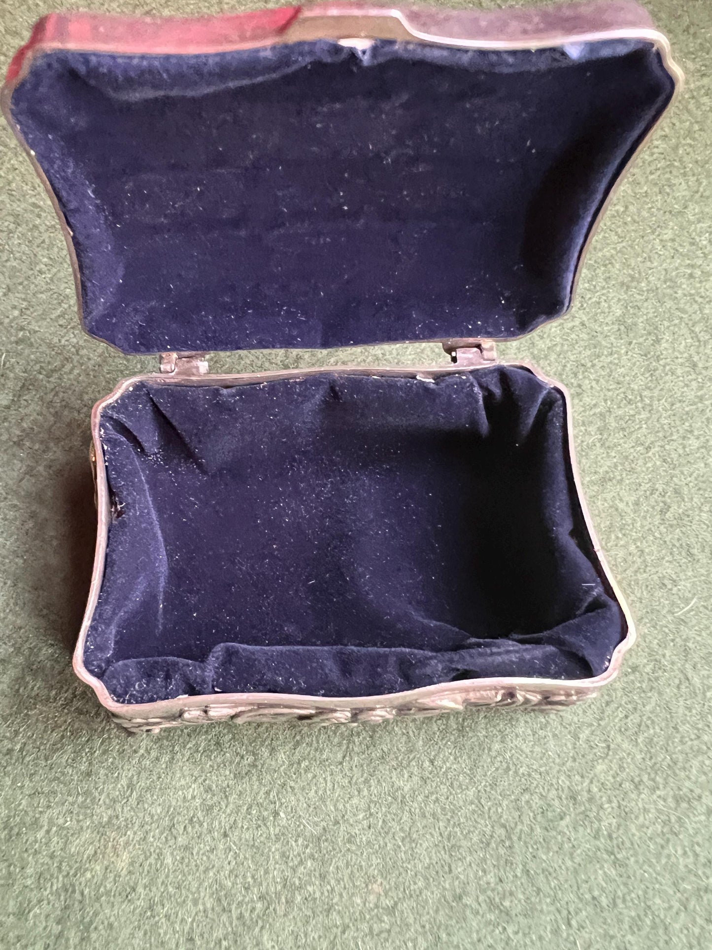 Vintage silver tone jewellery box. Embossed floral design treasure box blue lining.