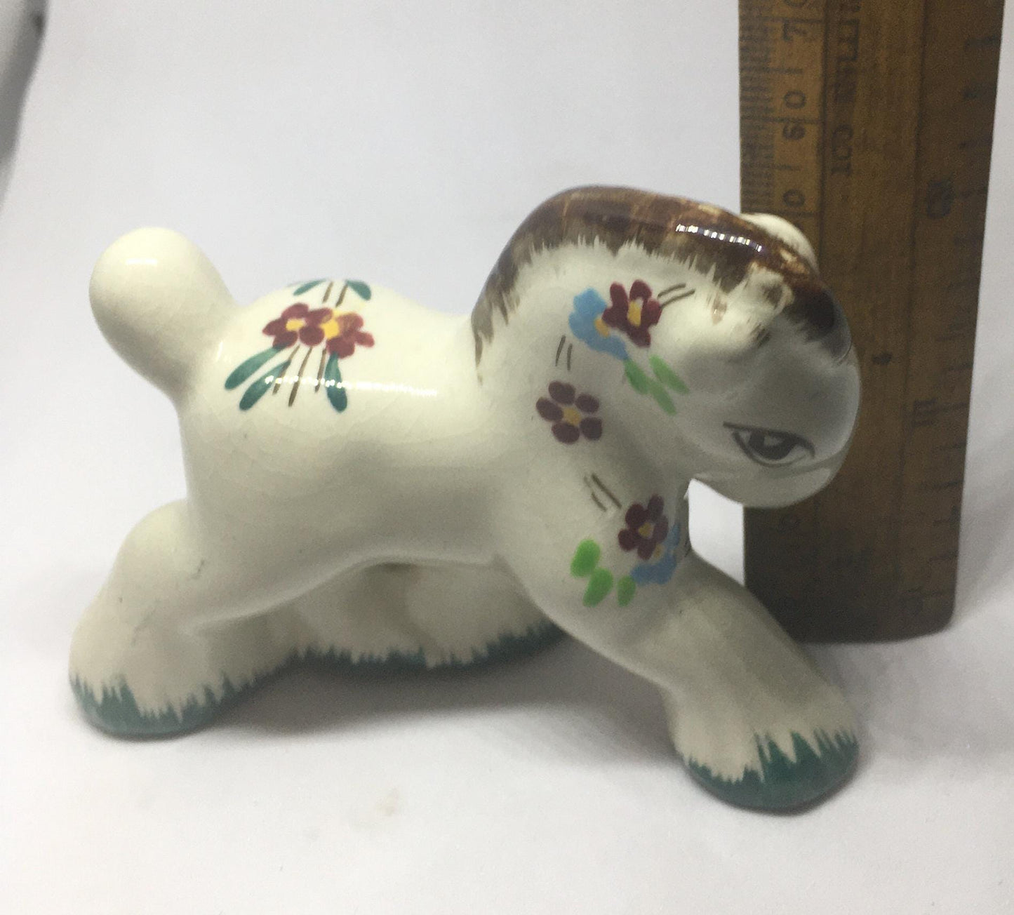 Folk art ceramic pony. Hand-painted prancing ceramic pony.
