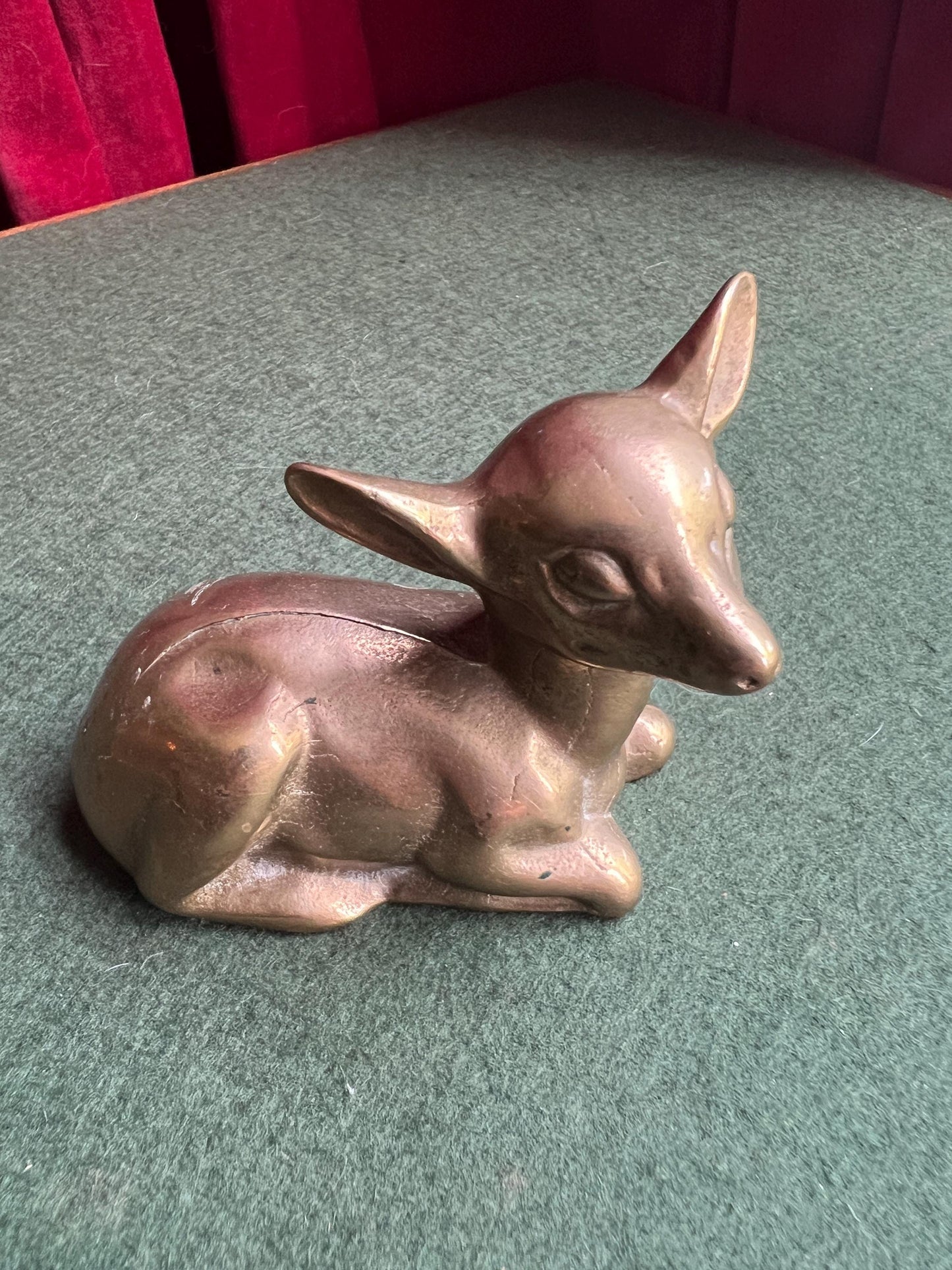 Vintage brass deer figurine. Resting fawn brass paperweight.