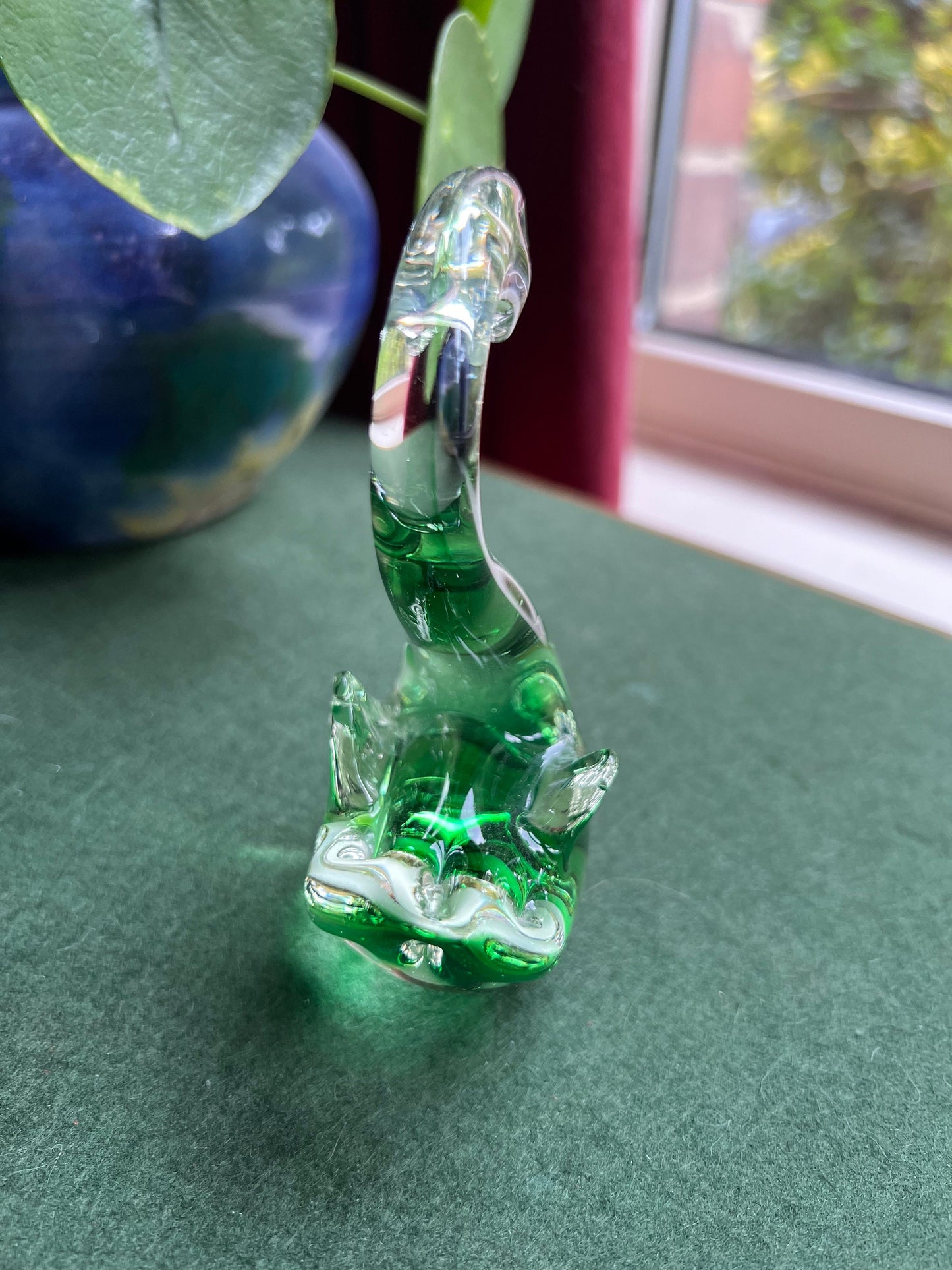 Beautiful hand blown green glass swan figurine.