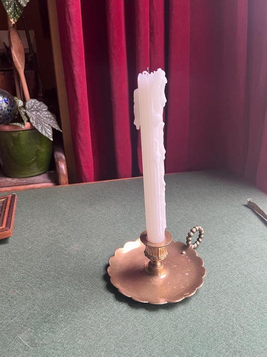 Vintage brass thumb hold candlestick. Ruffle edged candle holder.
