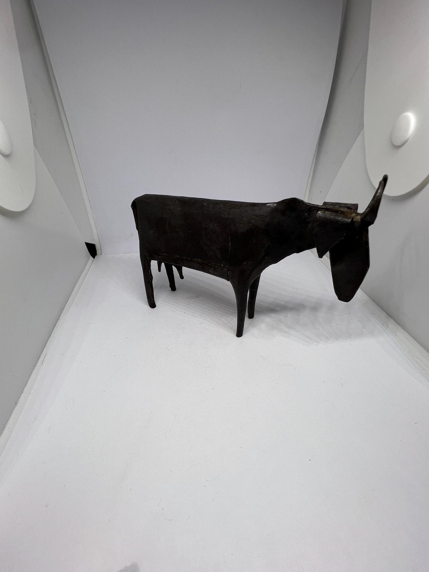 Brutalist metal cow sculpture.  Iron abstract folk art figurine.