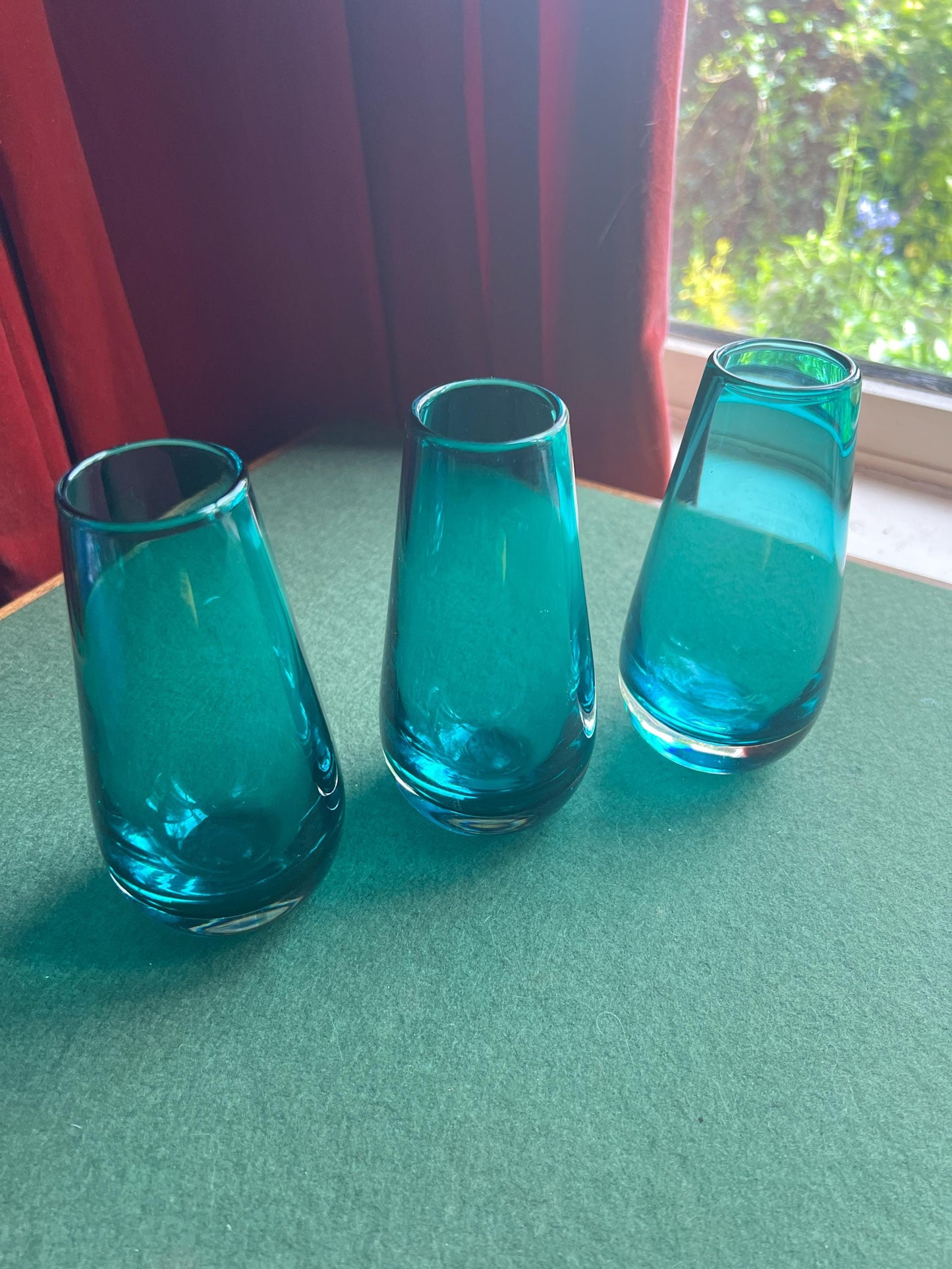 Beautiful teal blue hand blown glass posy vase. 3 available Sold separately