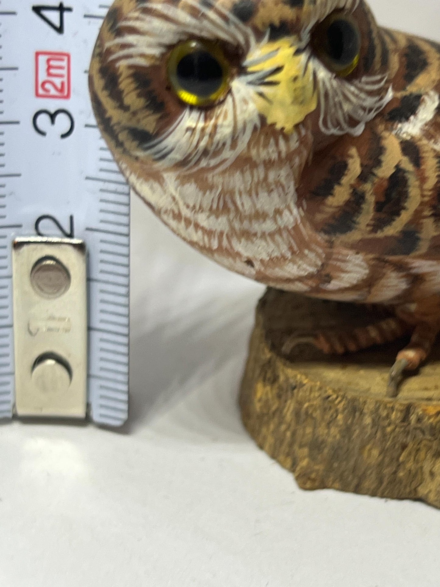 Vintage Hand Carved Wood Saw Whet Owl Hand painted with glass eyes on tree stump base.