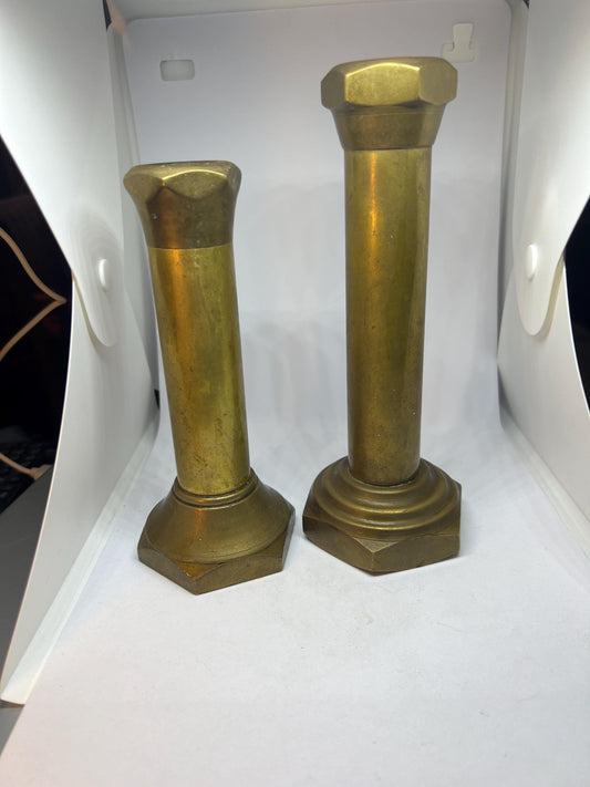 Steampunk style graduated candle holders.