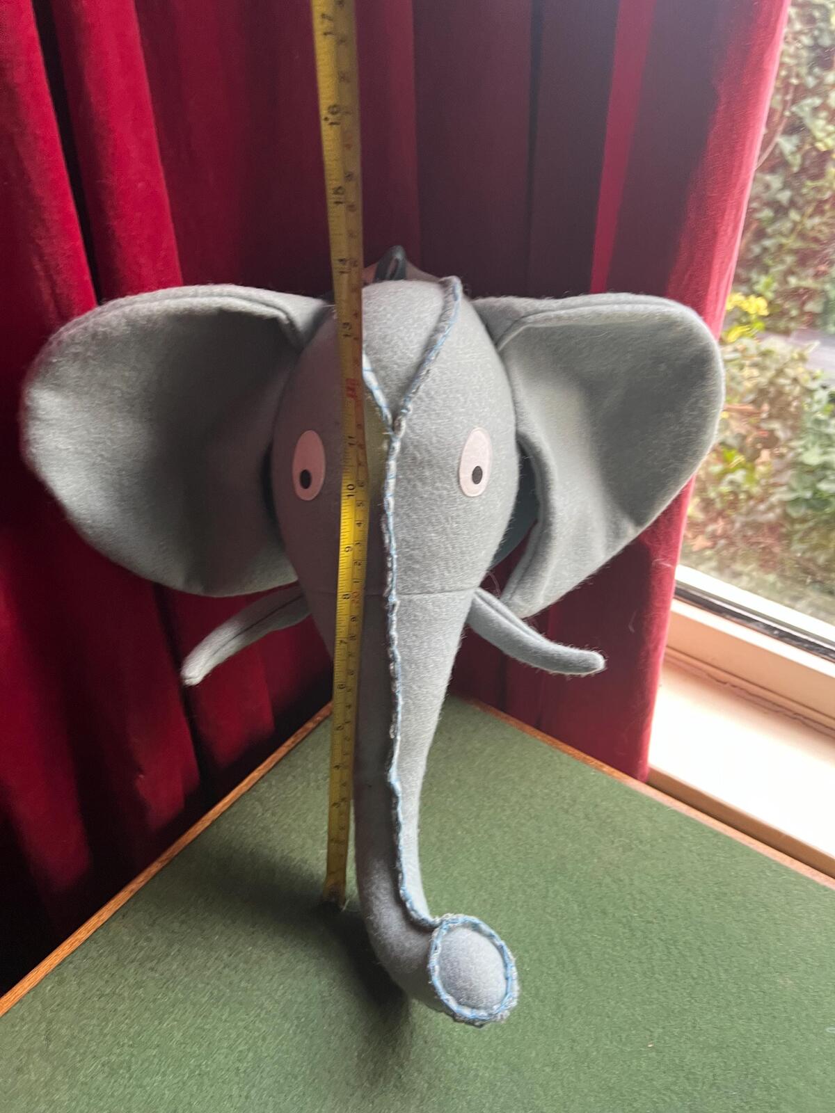 Felted elephant head wall decor for jungle nursery theme. Child's bedroom animal textile wall art.
