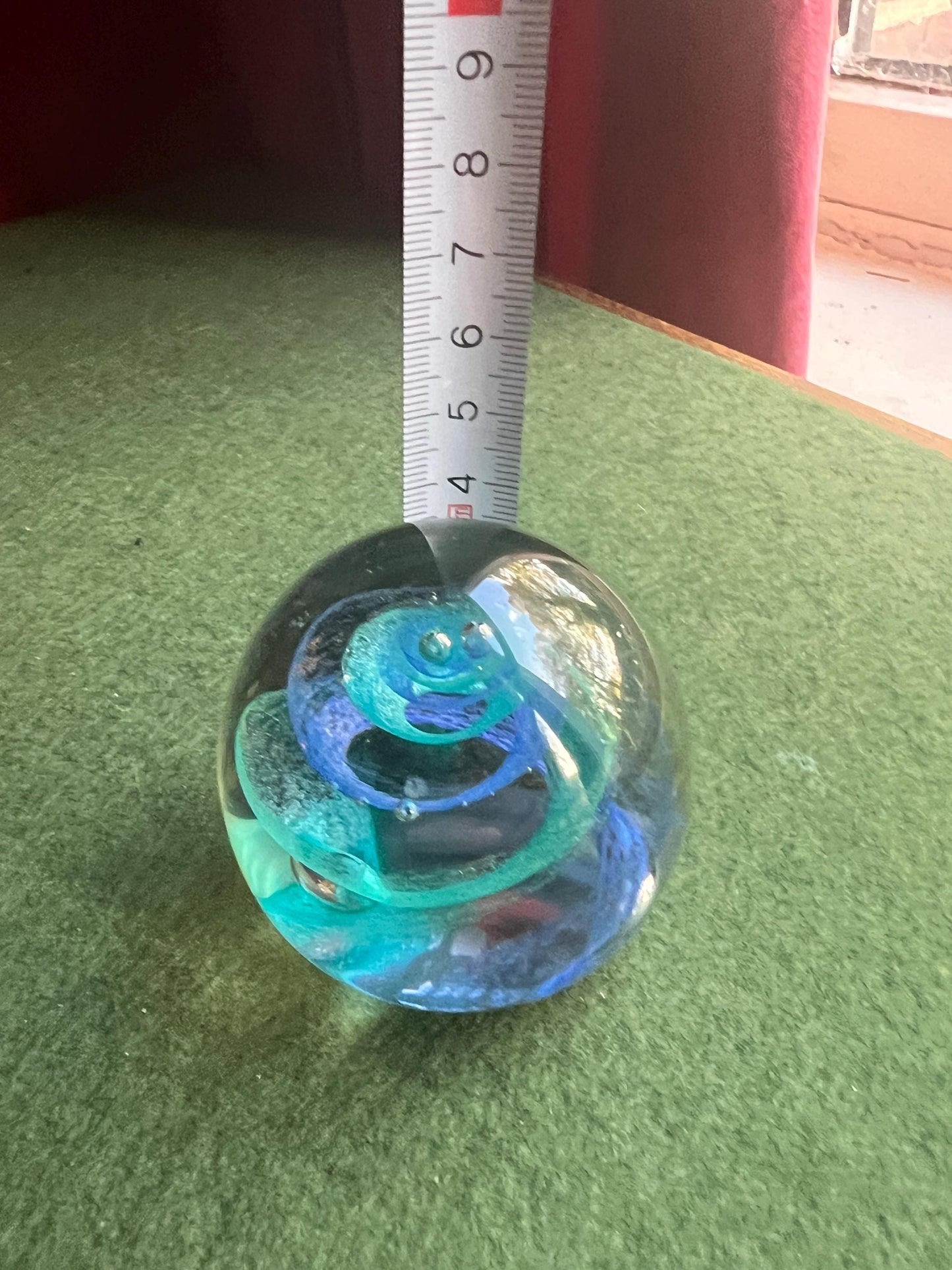 Vintage paperweight. Blue swirl in clear glass. Stamped Twirl Caithness Scotland.