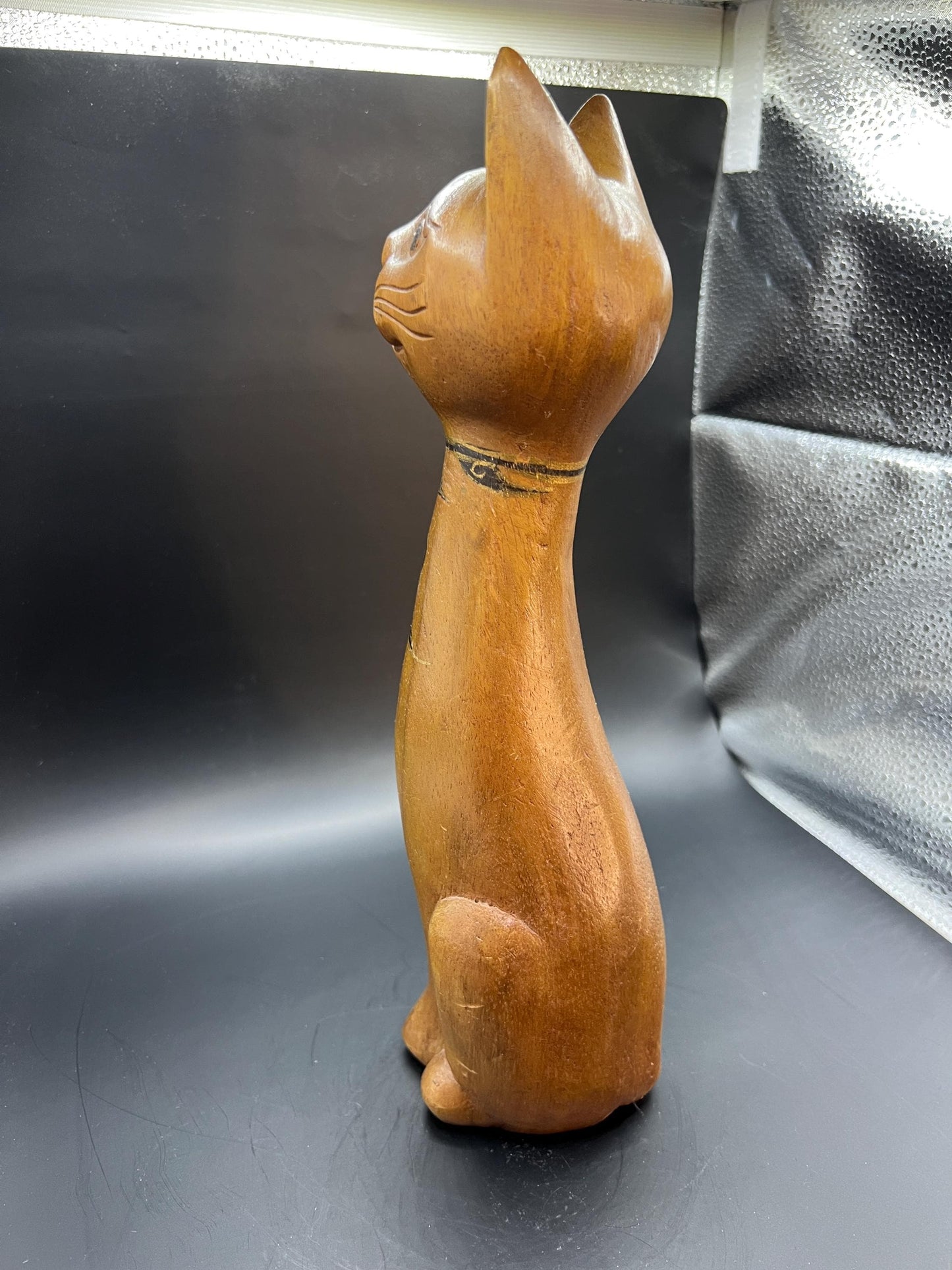 Hand carved wooden cat figurine. Made in Thailand.