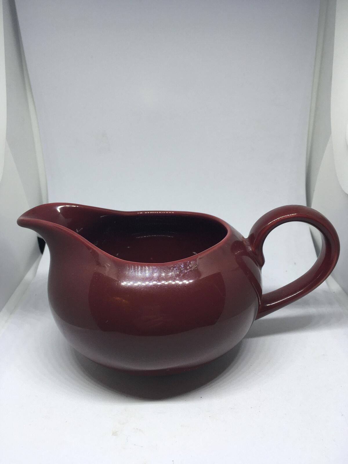 Vintage deep red Poole Pottery milk jug creamer sauce boat.