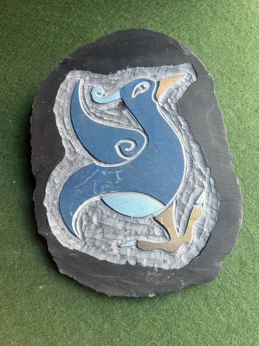 Stylised bird slate carving wall decor.
