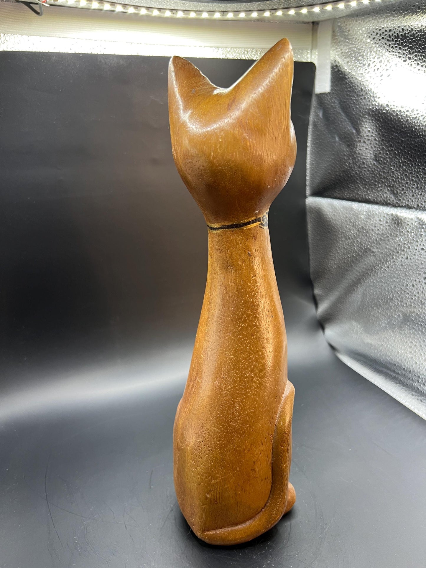 Hand carved wooden cat figurine. Made in Thailand.
