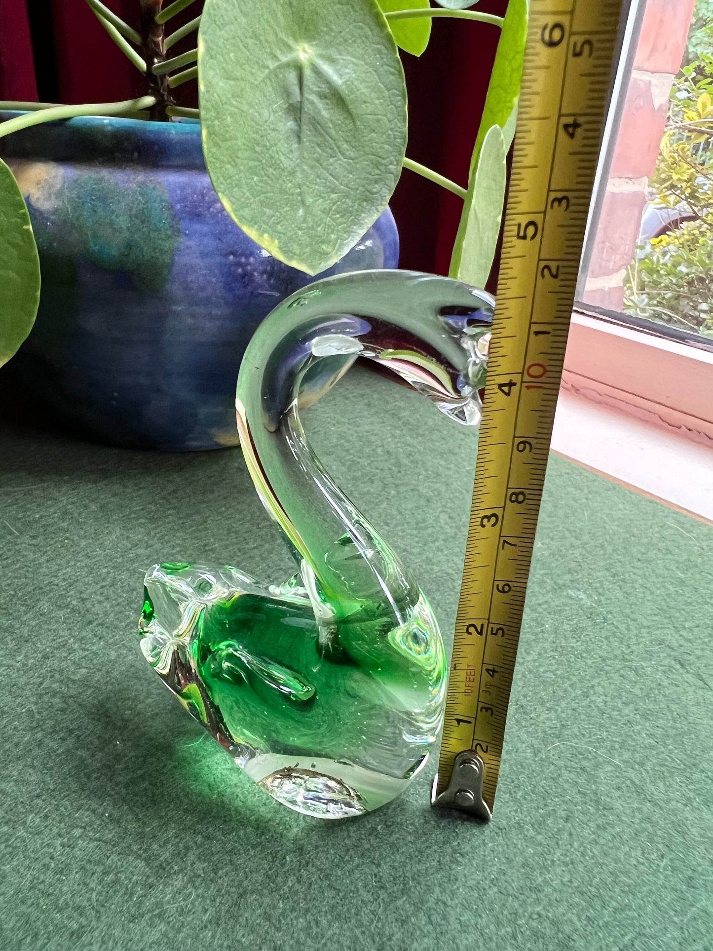 Beautiful hand blown green glass swan figurine.