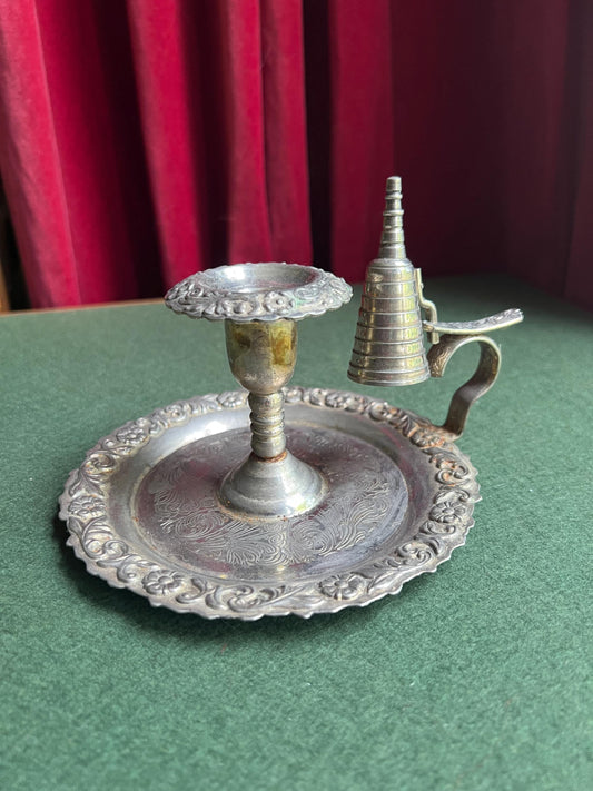 Vintage silver tone candle holder with snuffer.