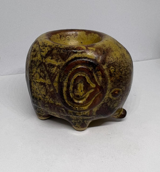 Ceramic Elephant tea light holder.