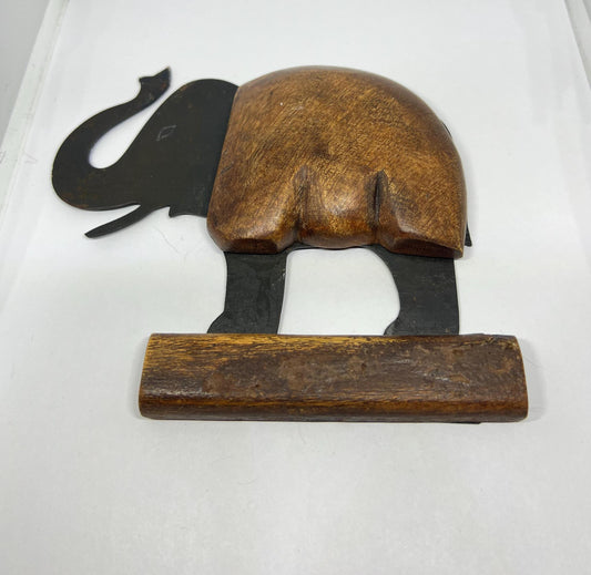 Wood and metal lucky elephant trunk raised wall hanging.