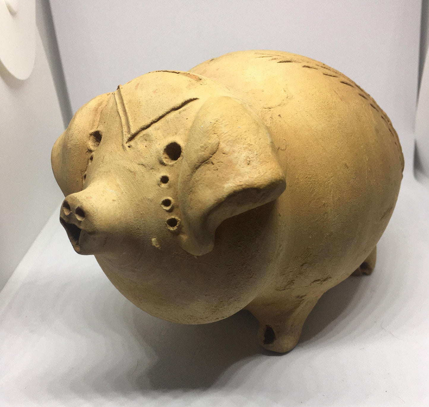 Studio pottery piggy bank.