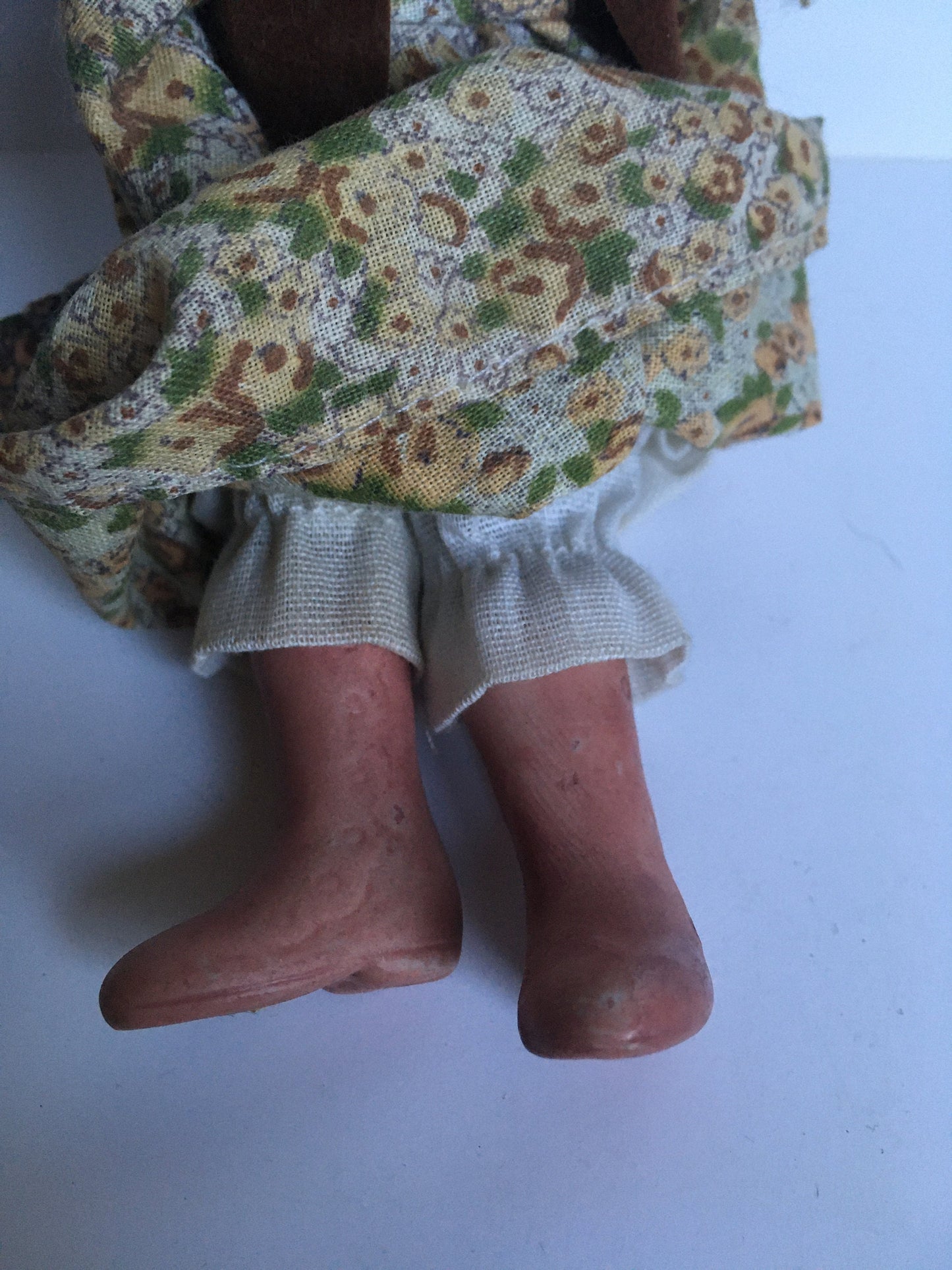 1970s ceramic doll in original clothes.