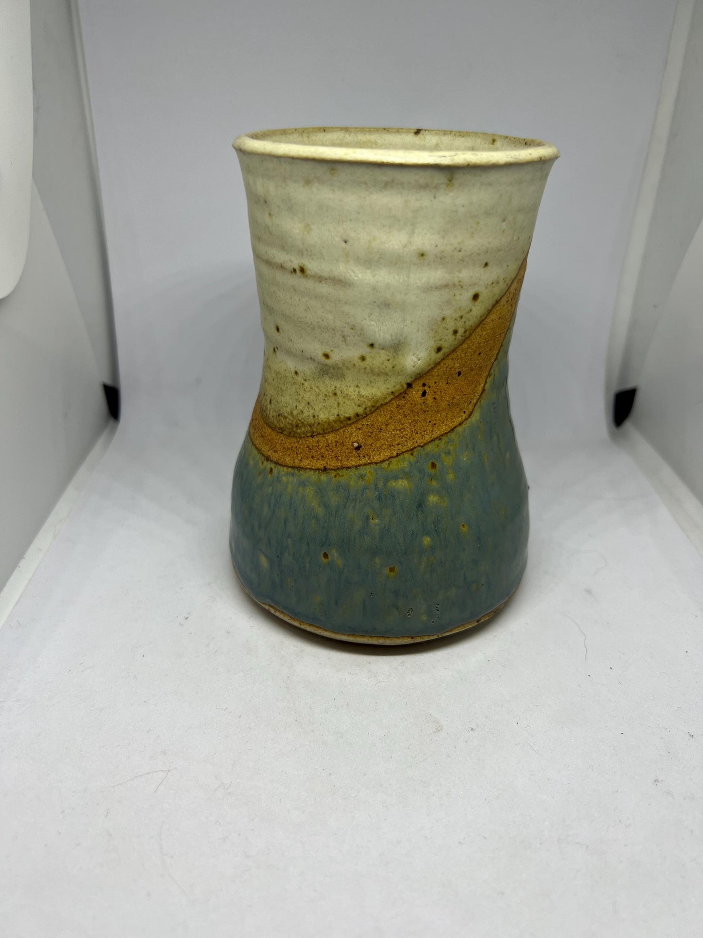 Studio pottery Blue brown speckled glaze flower vase.