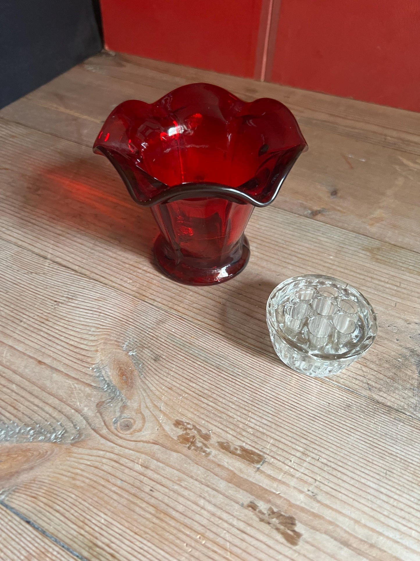 Art Deco style red glass posy vase with original clear glass flower frog. UV reactive.