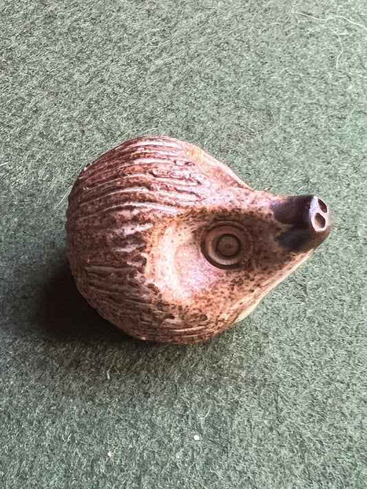 Miniature hedgehog figurine. 1970s Studio pottery hoglet ornament.