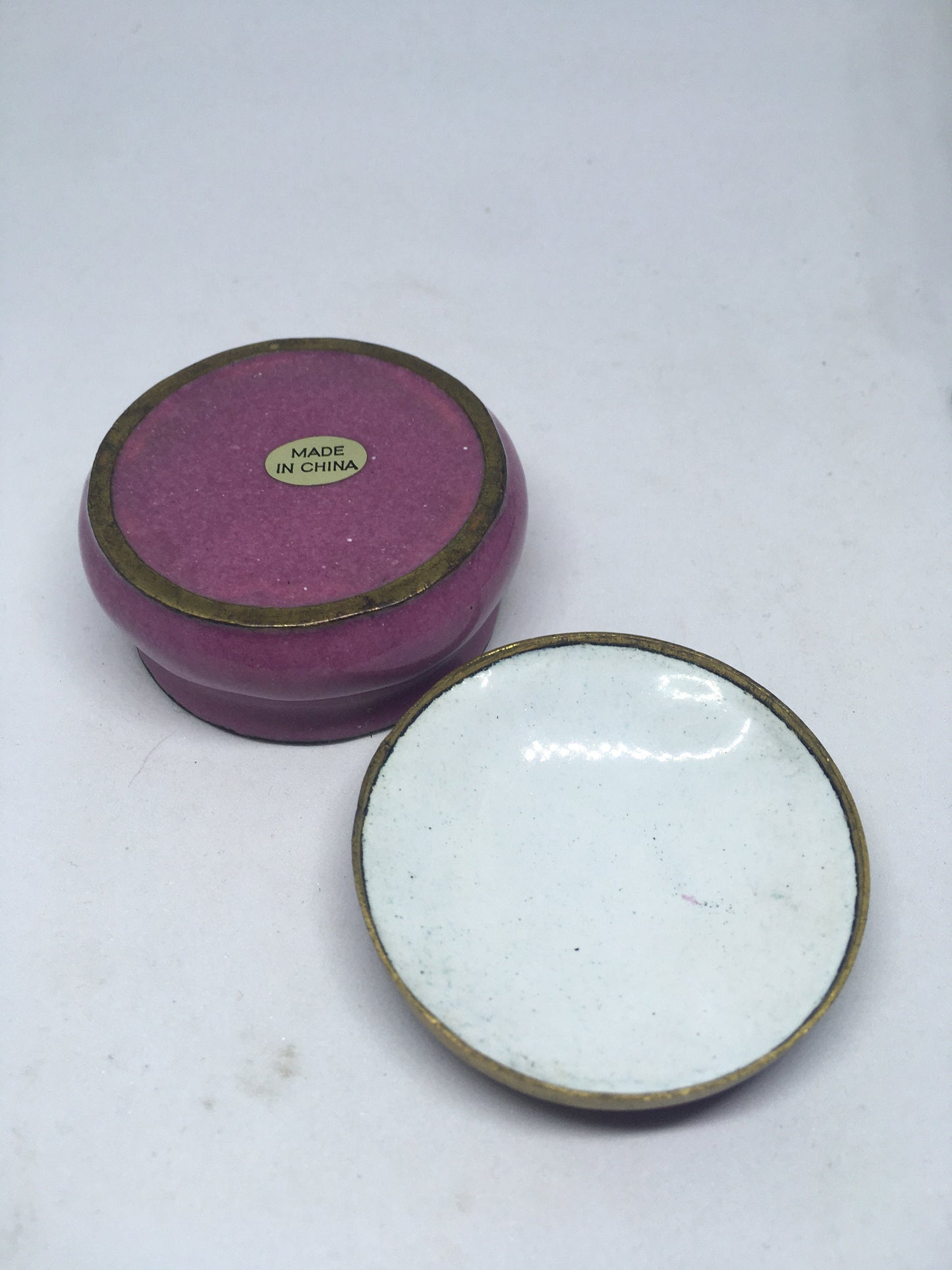 Enamel cloisonne lidded trinket box. Purple enamel with butterfly and flower decoration.