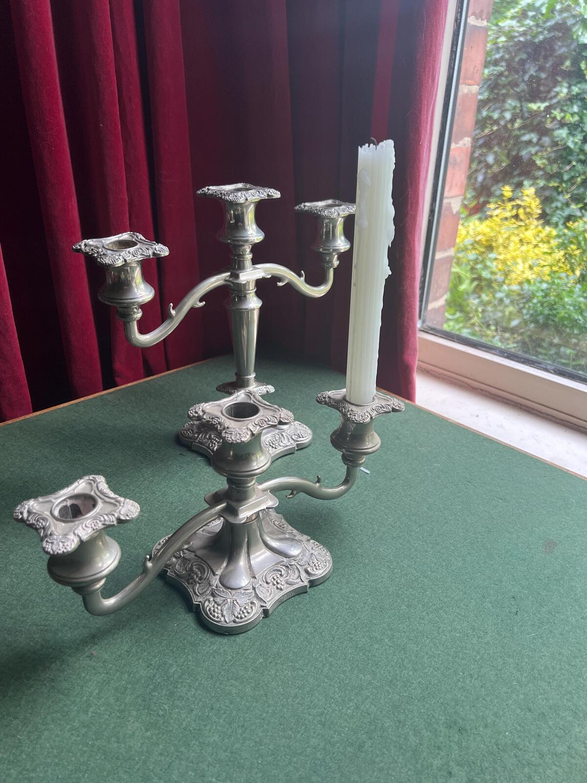 Pair of Vintage antique candlestick holders. Grape and vine pattern silver plated 3 arm candle holders. Mismatched heights.